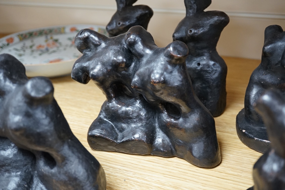 Three pairs of small black figural abstract sculptures, together with two similar sculptures. (8). Tallest 15cm high